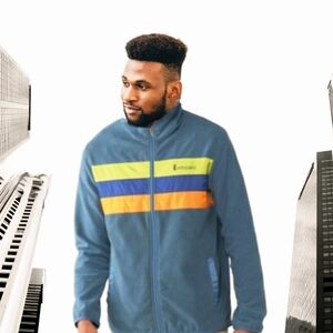 Cotopaxi Blue Windbreaker with Multicolor Stripes